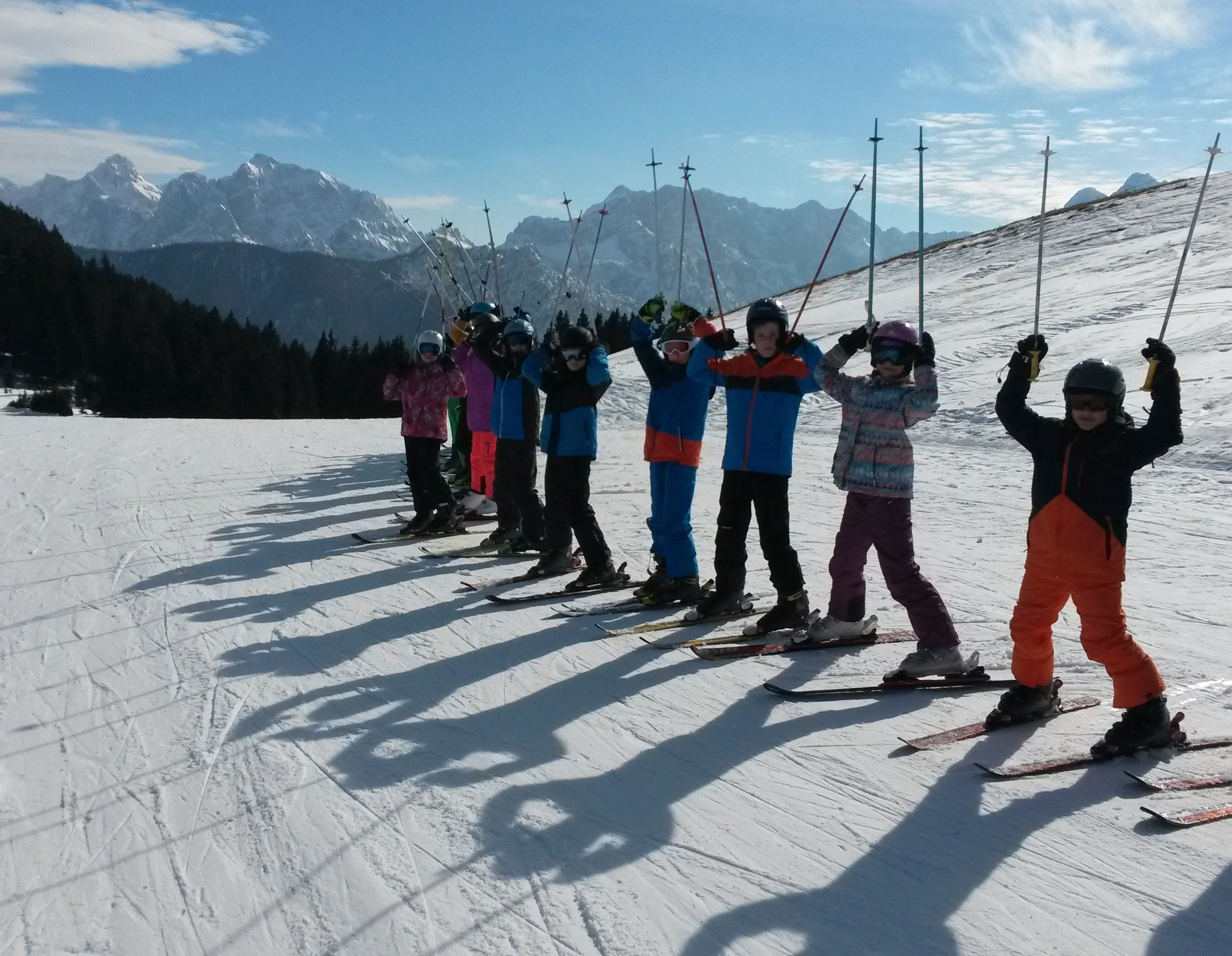 Skiers standing in a row