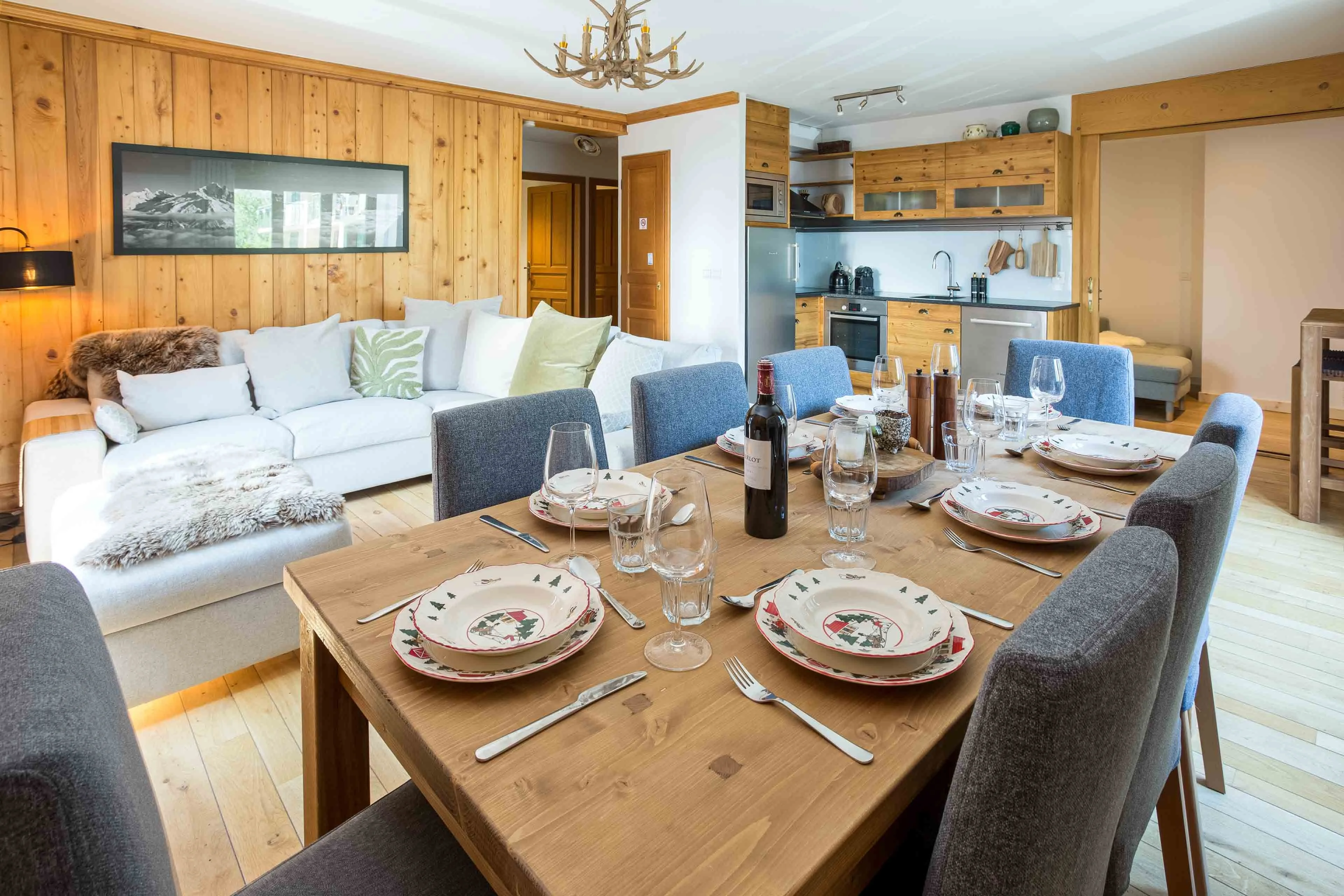 A Chamonix apartment with nicely dressed dinner table in a mountain style