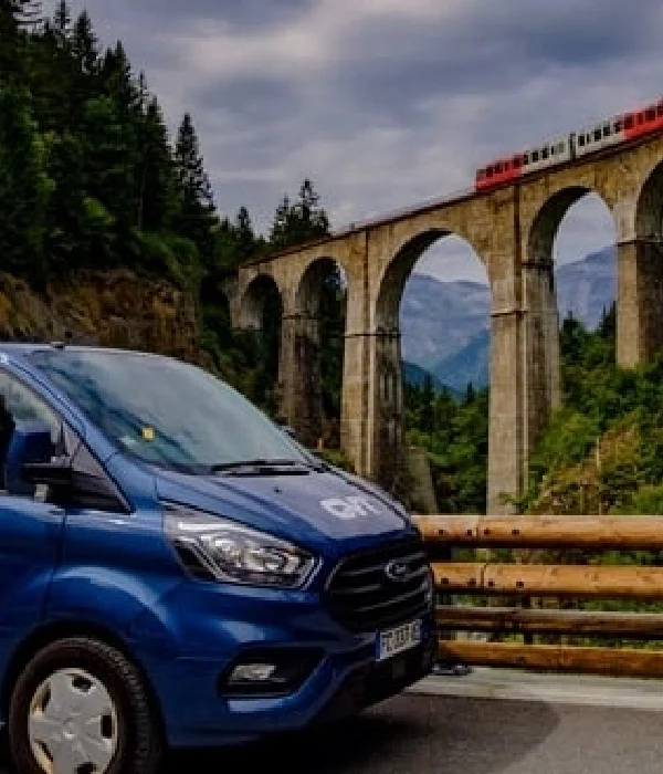 A van in front of Viaduc Sainte-Marie in the Chamonix Valley