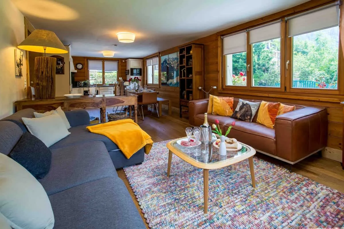 Open plan living area with lounge, dining and kitchen