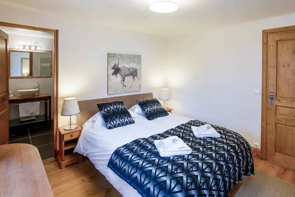 Master bedroom with double bed and ensuite bathroom