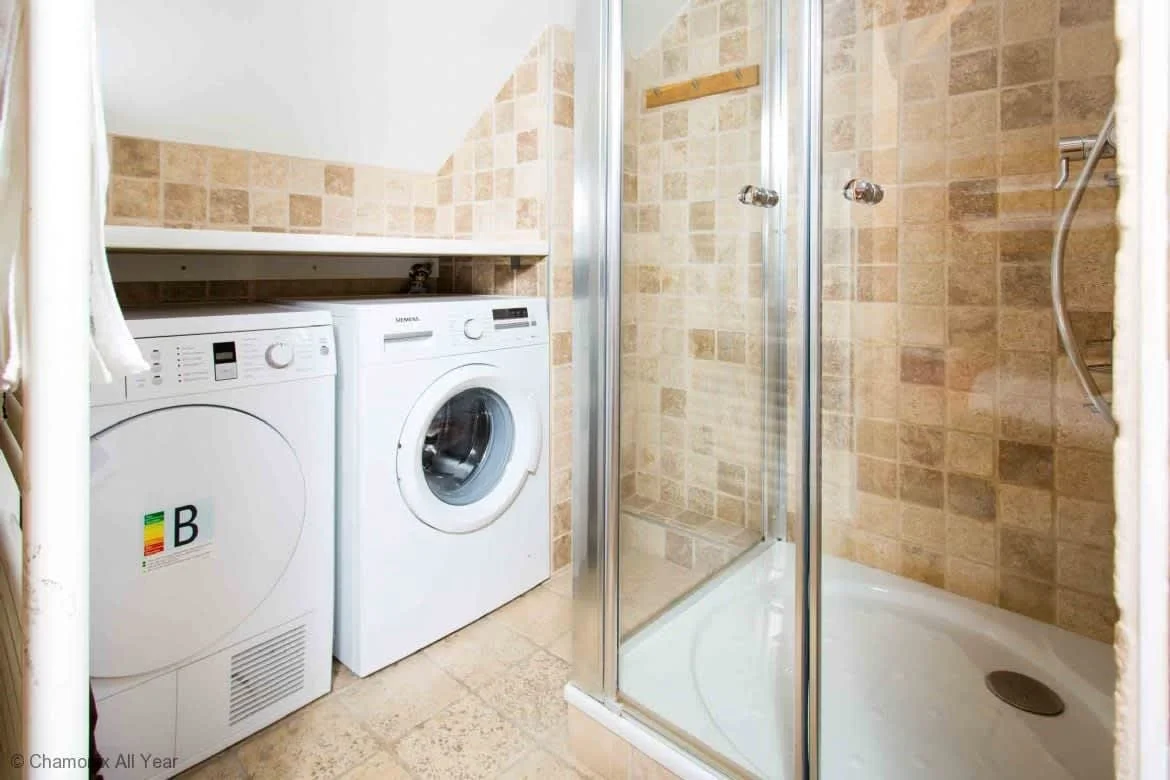 Washing machine and dryer off bunk room