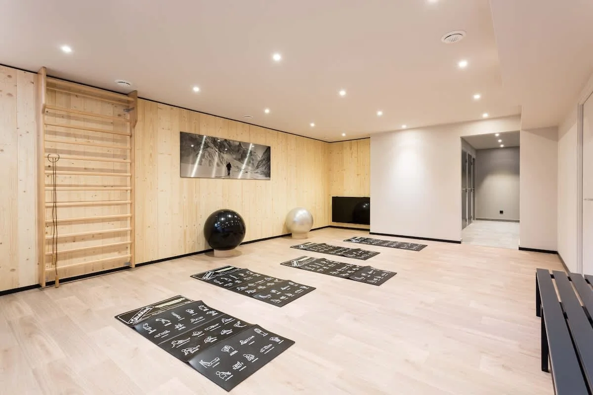 The lower level of the fitness room has swiss balls and exercise mats