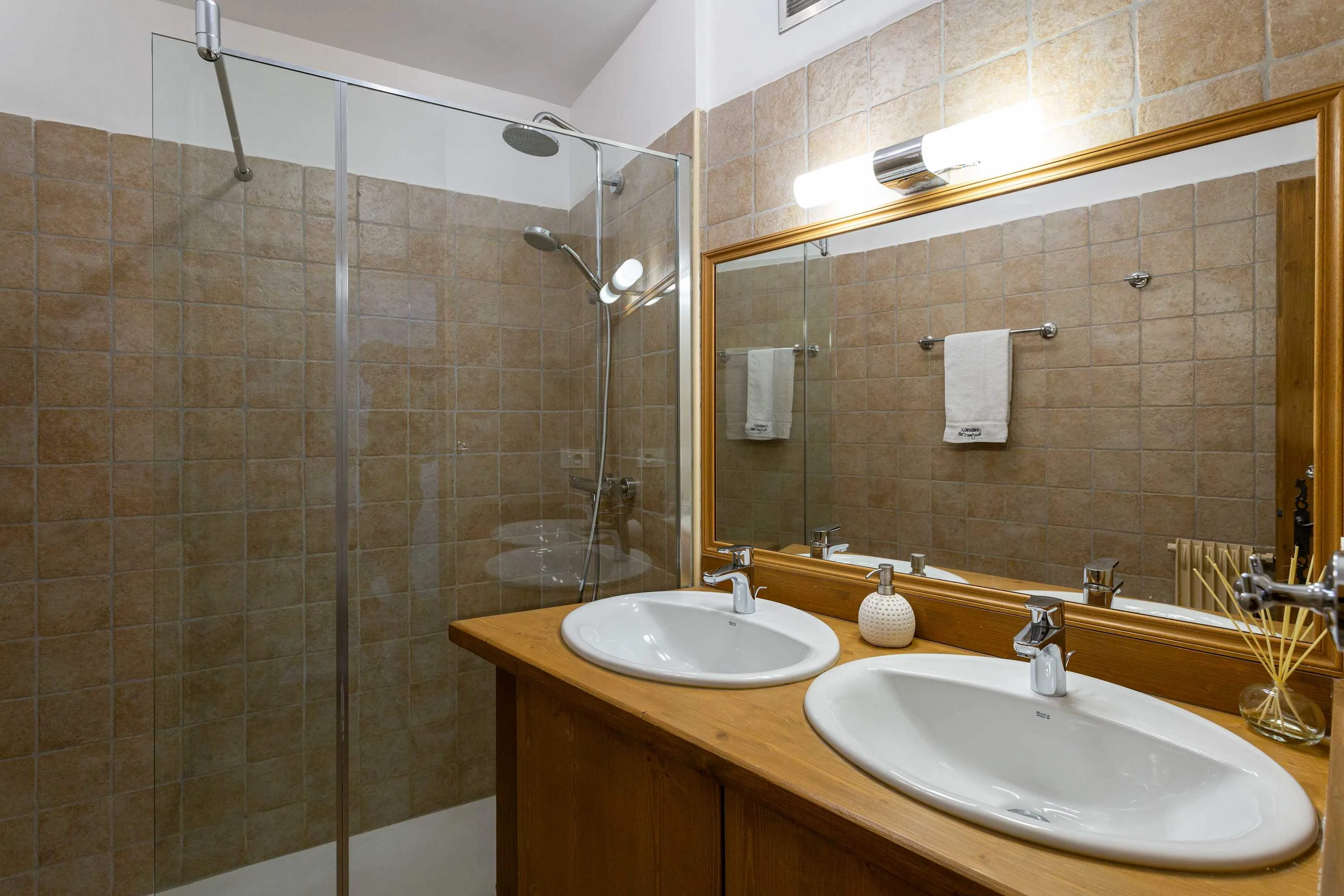 Family bathroom with shower and twin sinks