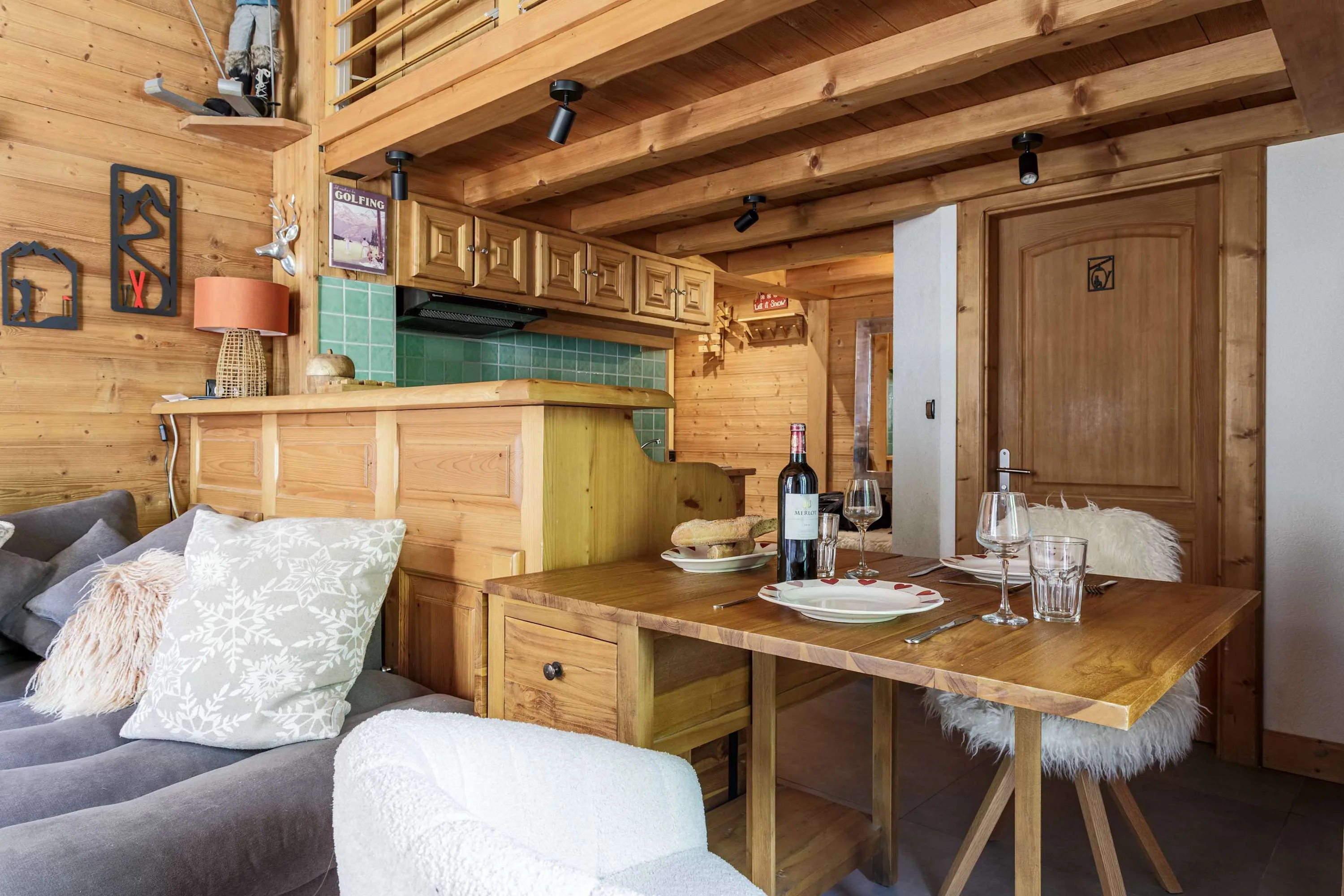 Breakfast bar and view of mezzanine with access to bedroom