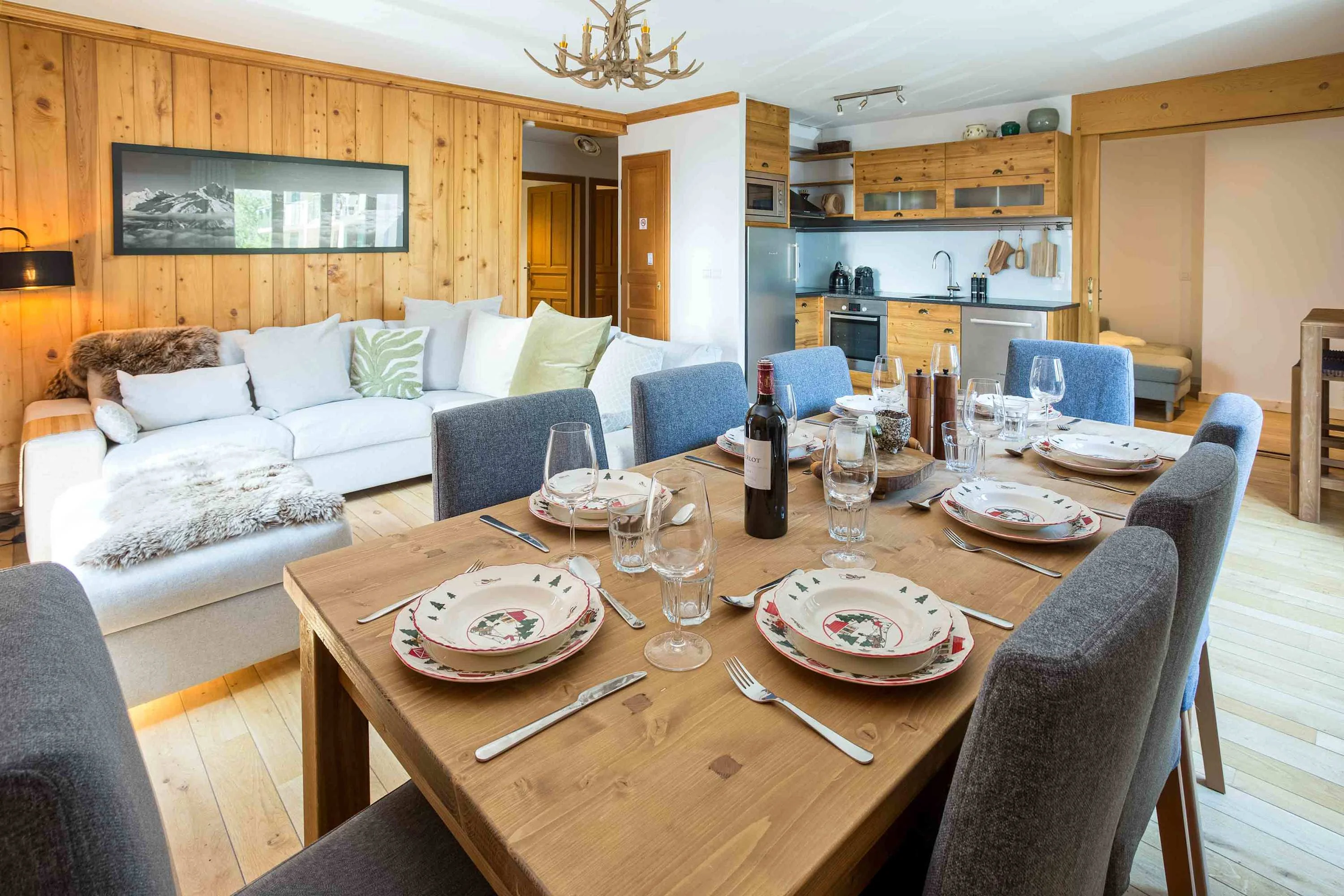Open plan living space with dining table that seats 8