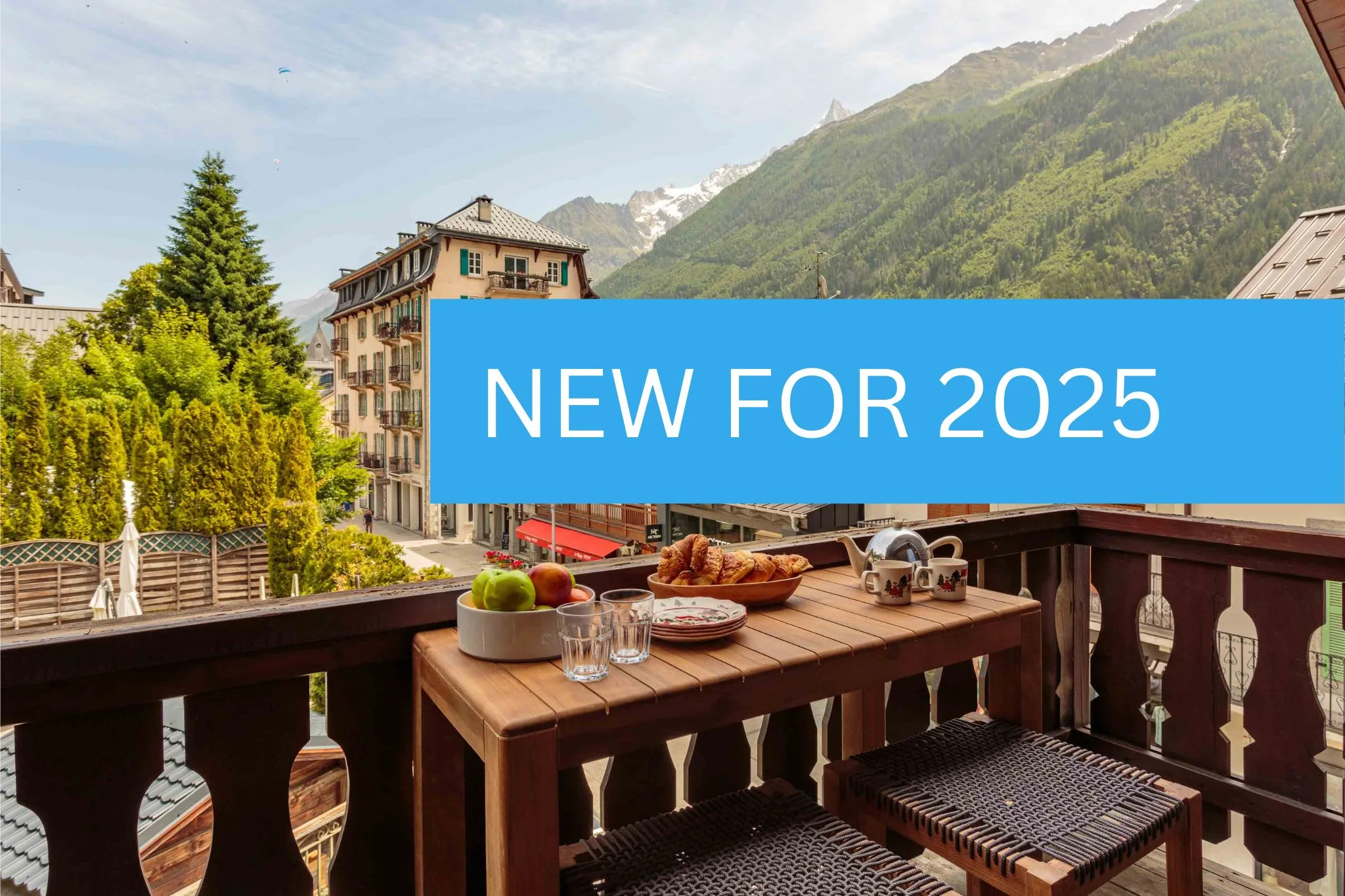 Balcony off living room with views over the main street and mountains beyond
