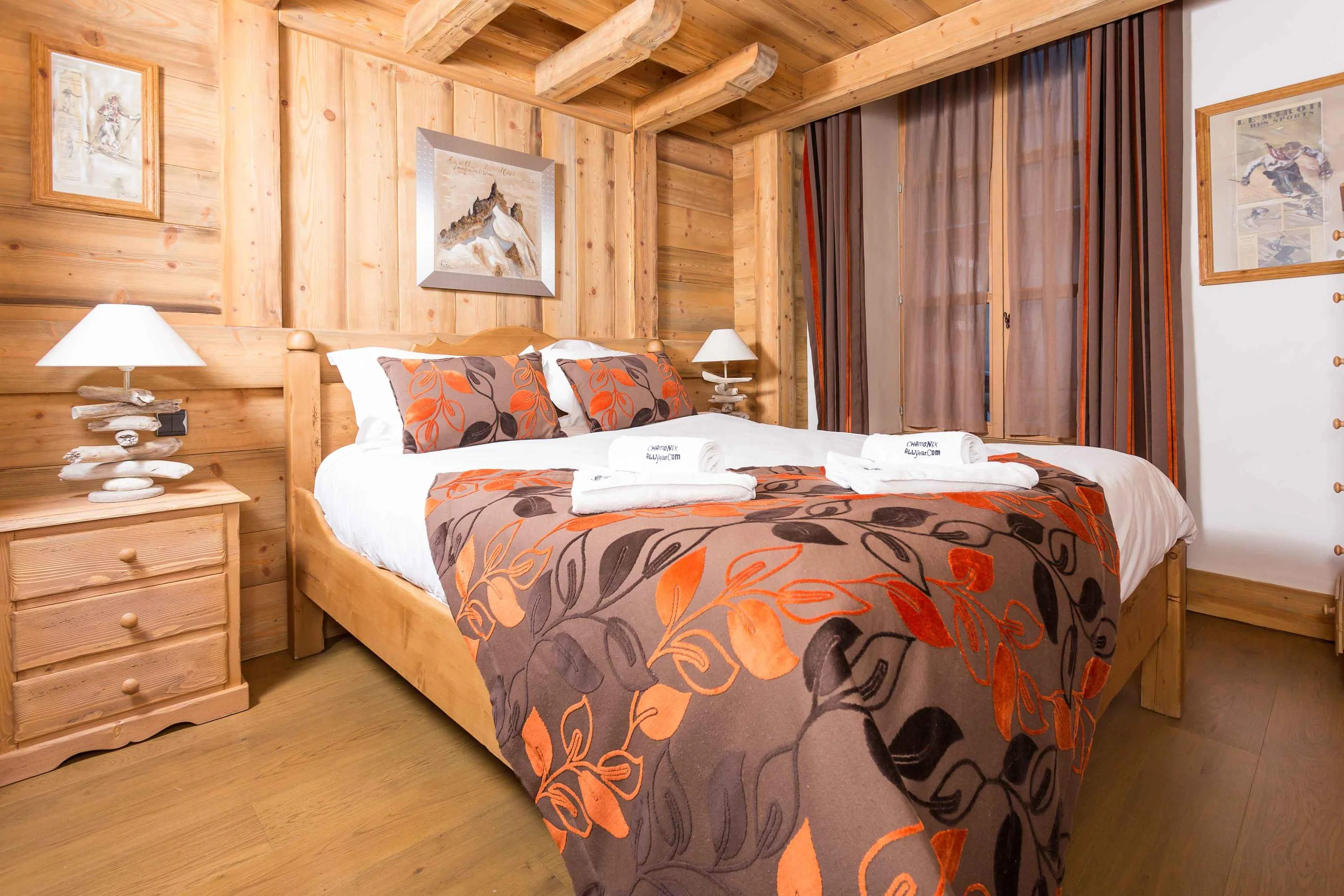 Master bedroom has a king-sized bed & beautiful hand-crafted furniture