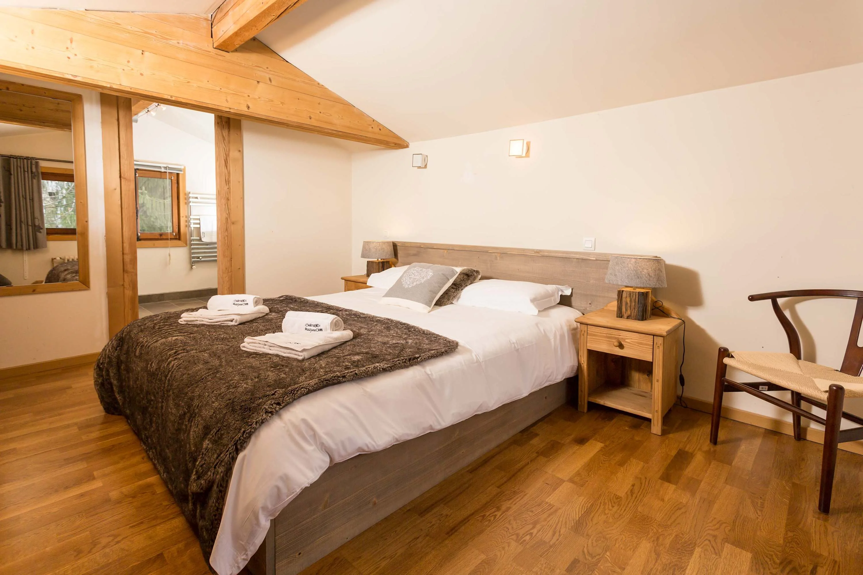 Master bedroom with king-size bed and ensuite bathroom