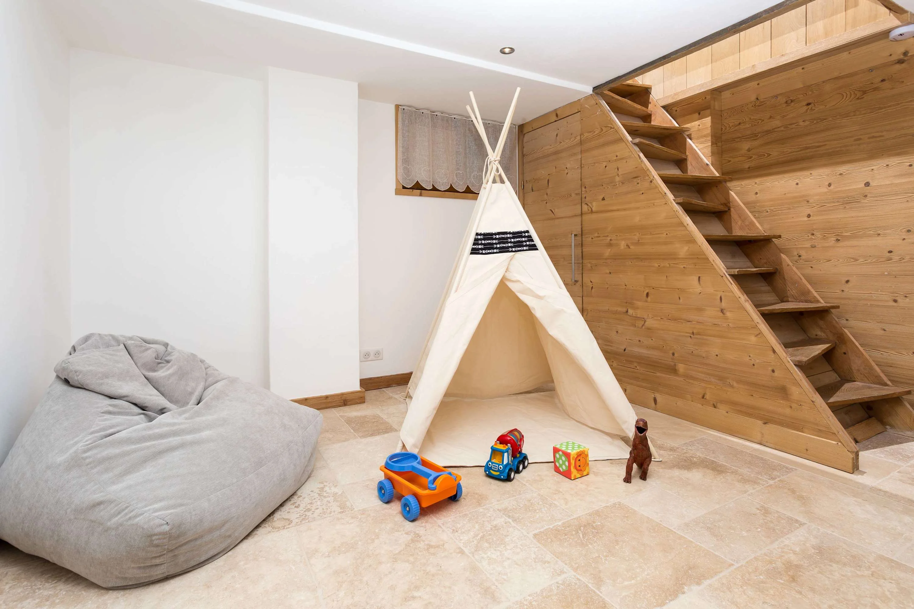 Lower ground floor snug area, accessed by a ladder staircase