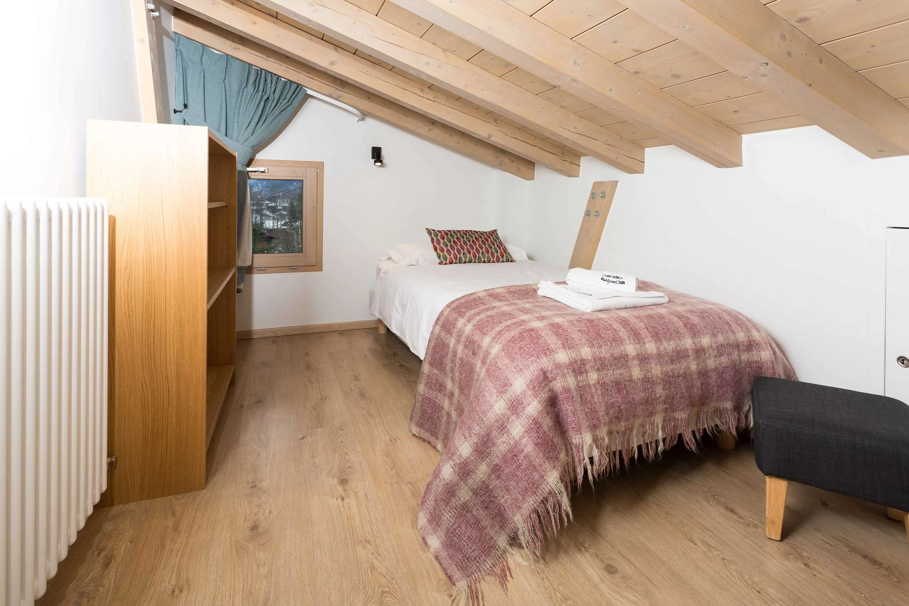 One of the single beds in the mezzanine twin room