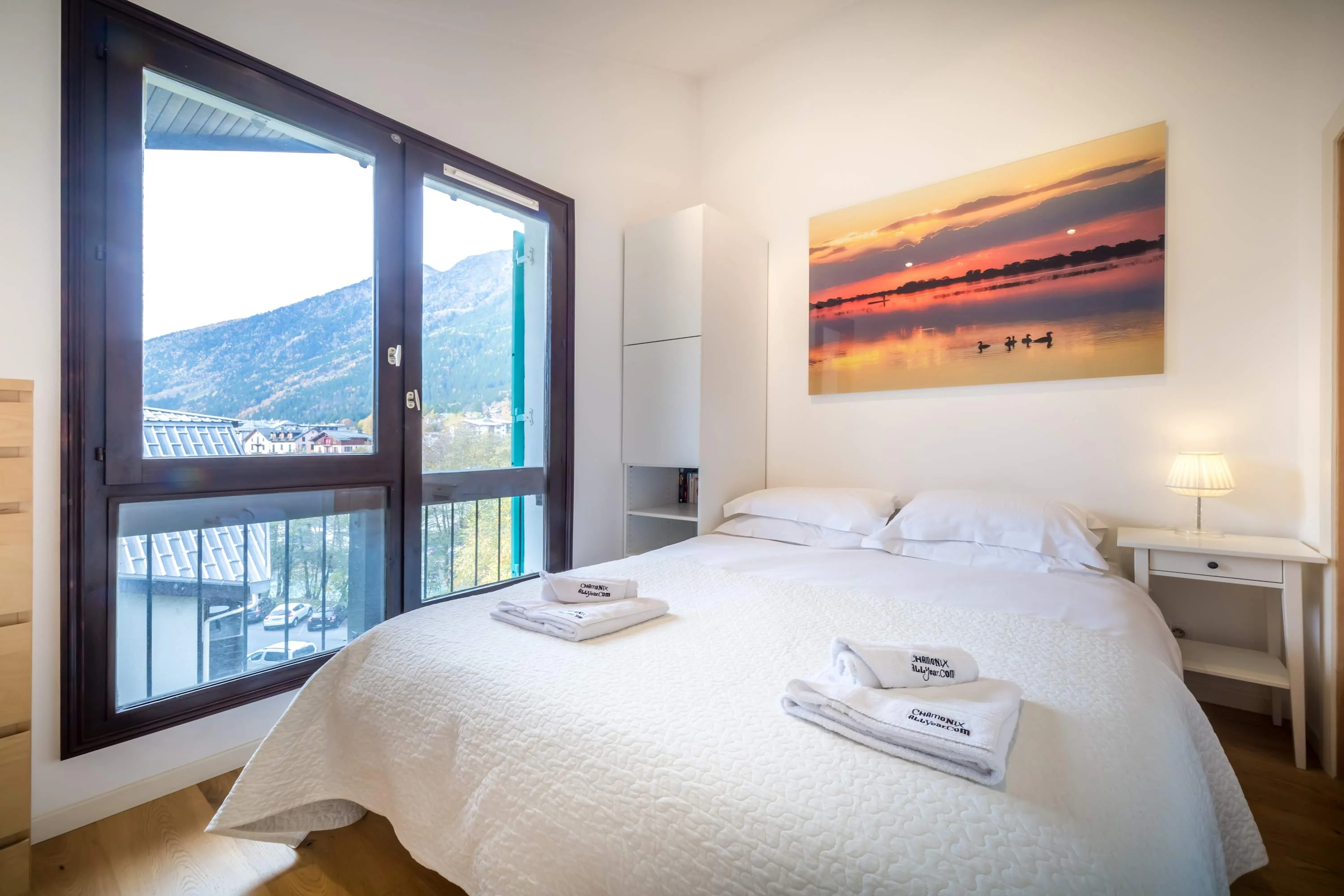 Double bedroom has large windows to enjoy the mountain views