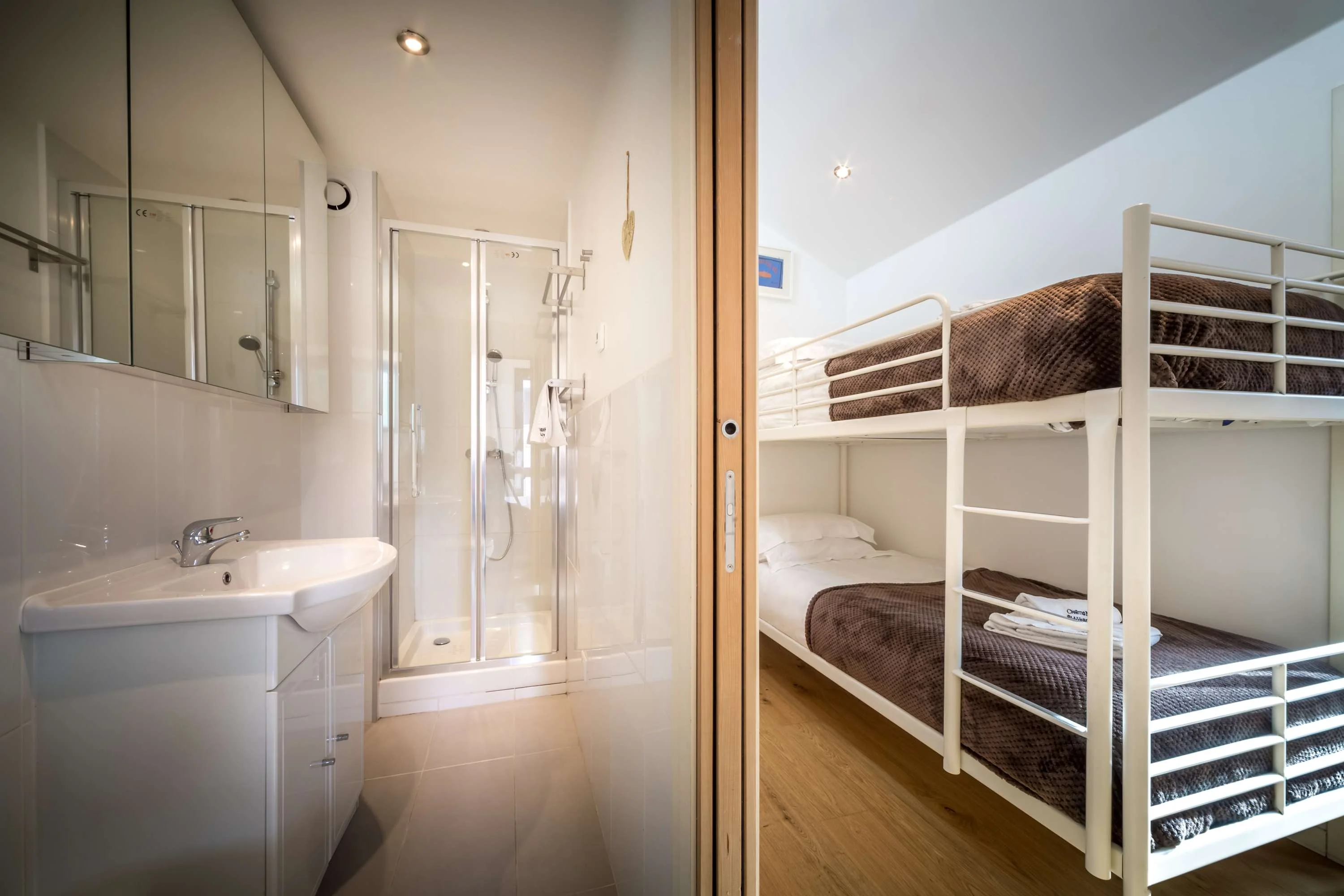 Bunk room shares the Jack'n'Jill bathroom with shower