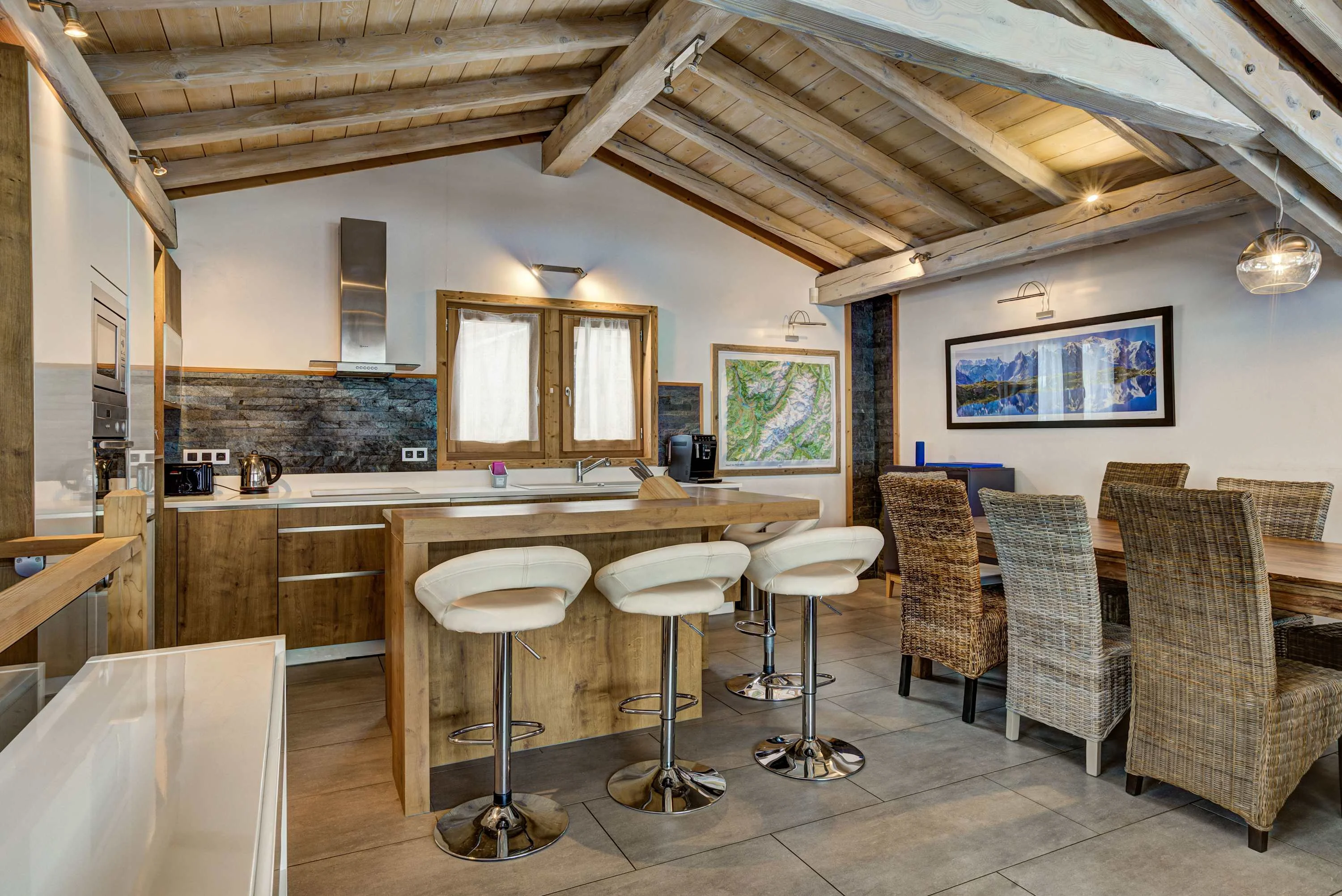 Kitchen with island and bar stools