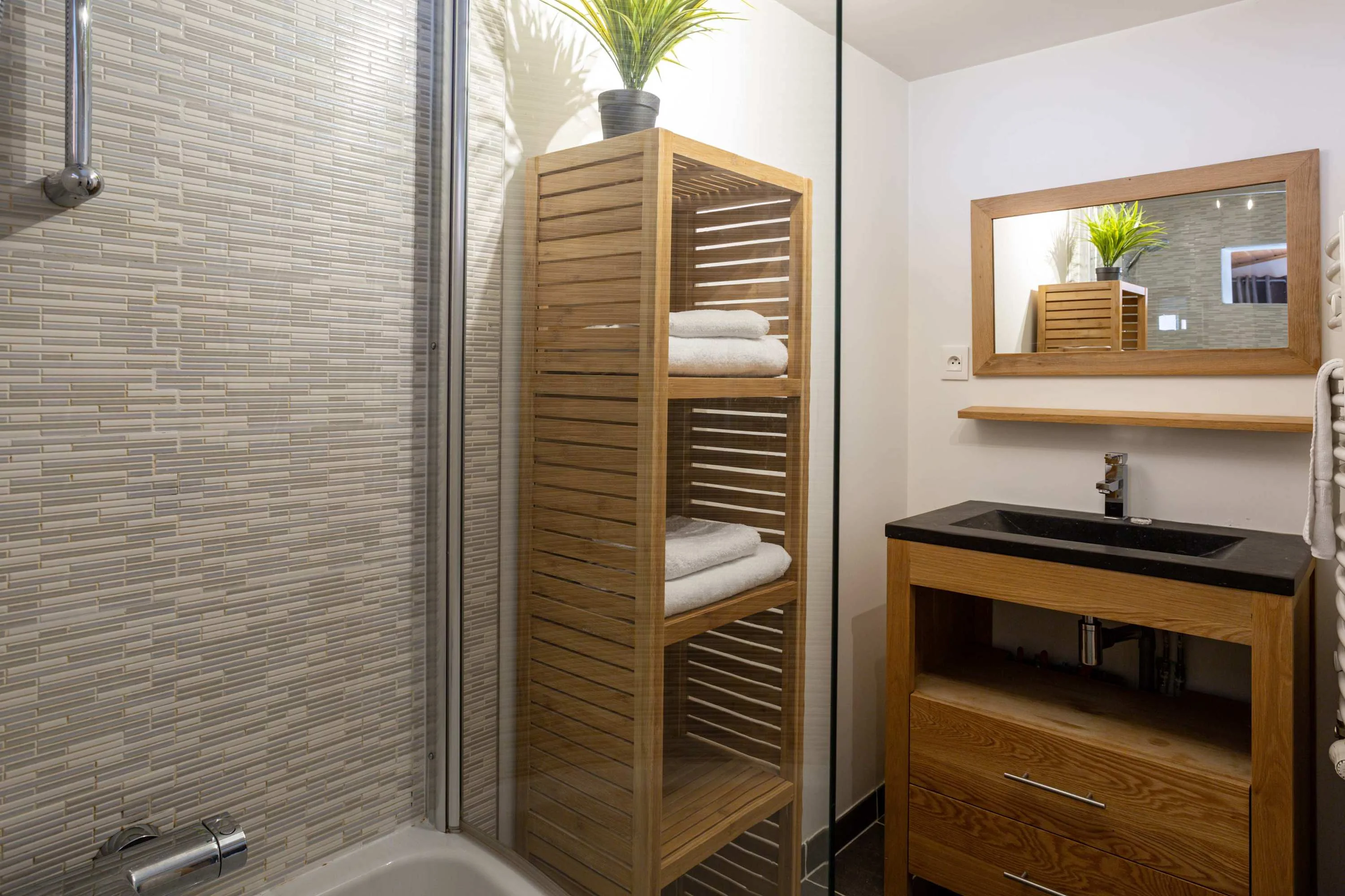 Bathroom with bath and overhead shower