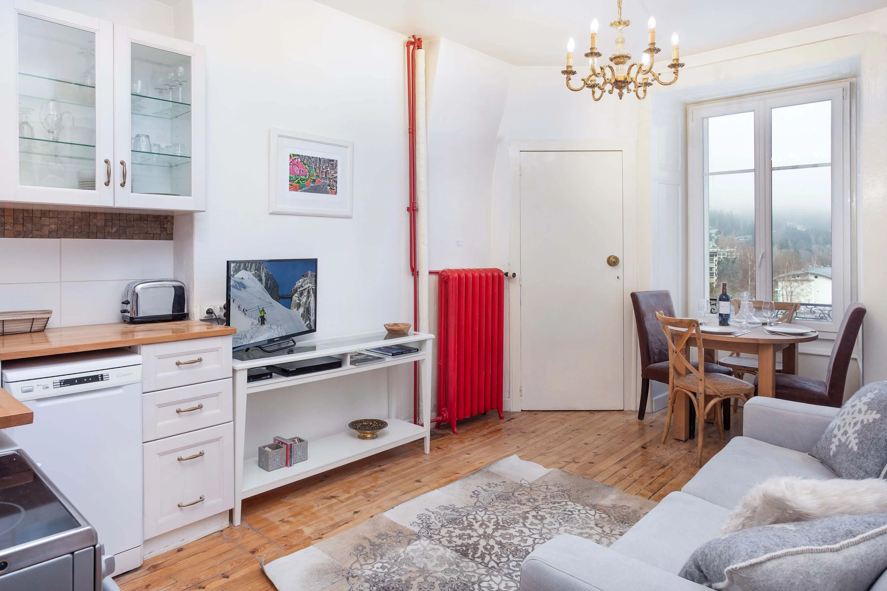 Lounge with flatscreen TV and dining area