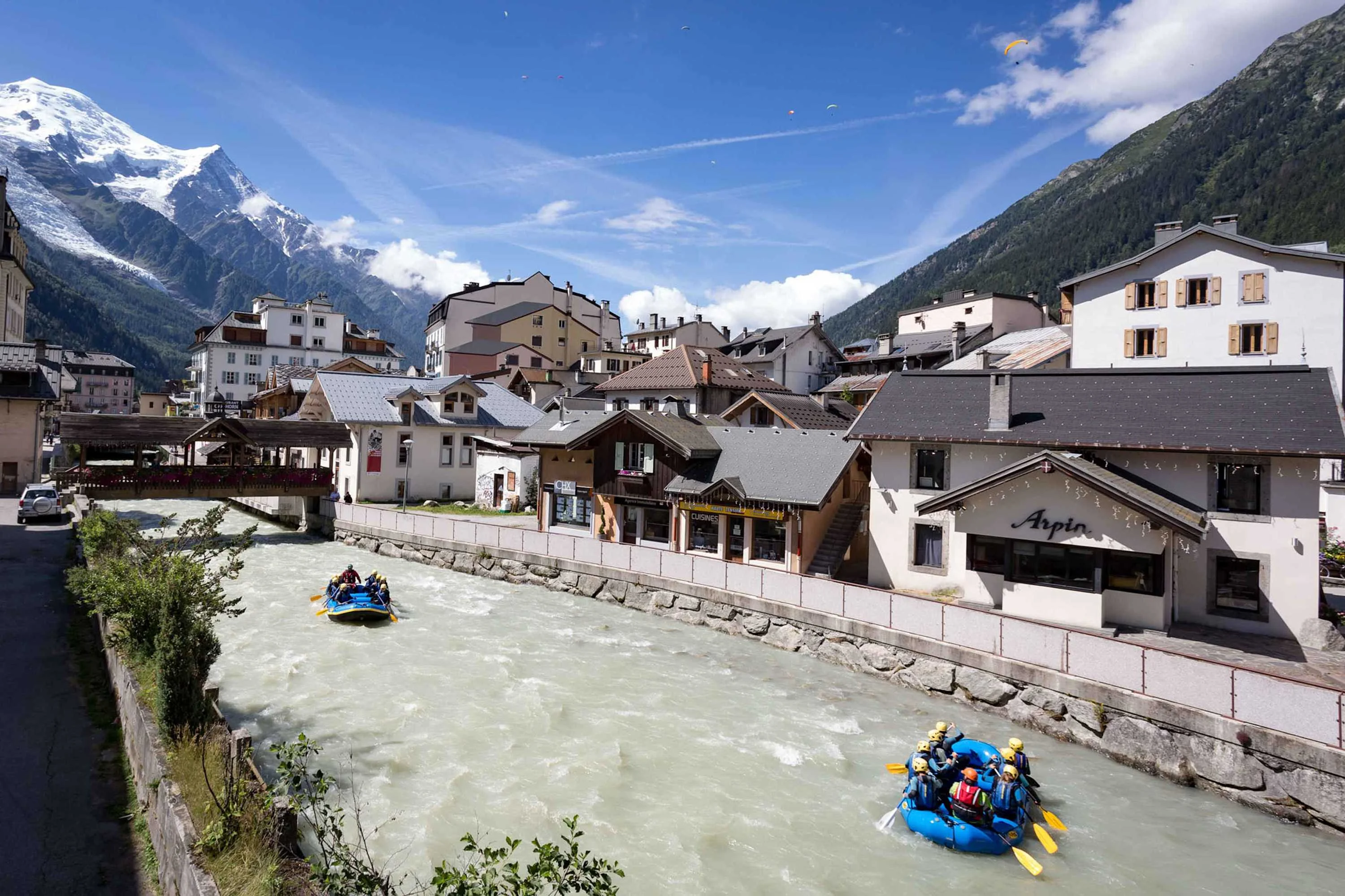View over river in summer with rafters