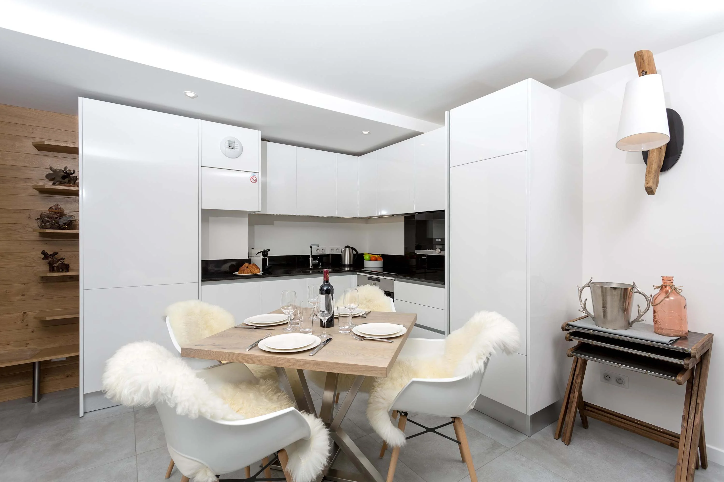 Modern, fully-equipped kitchen and dining table seats 4
