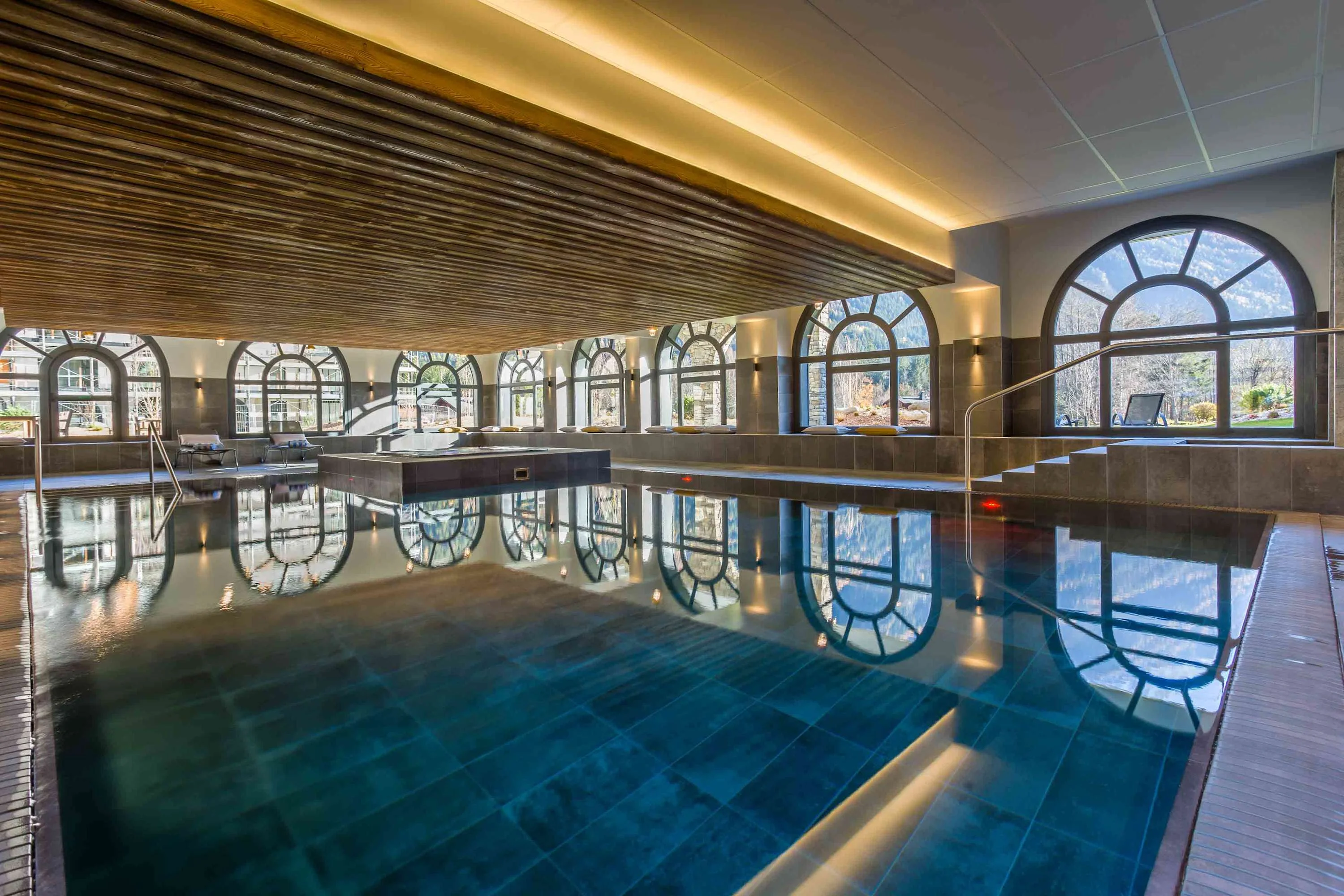 Heated indoor pool with cushioned seating
