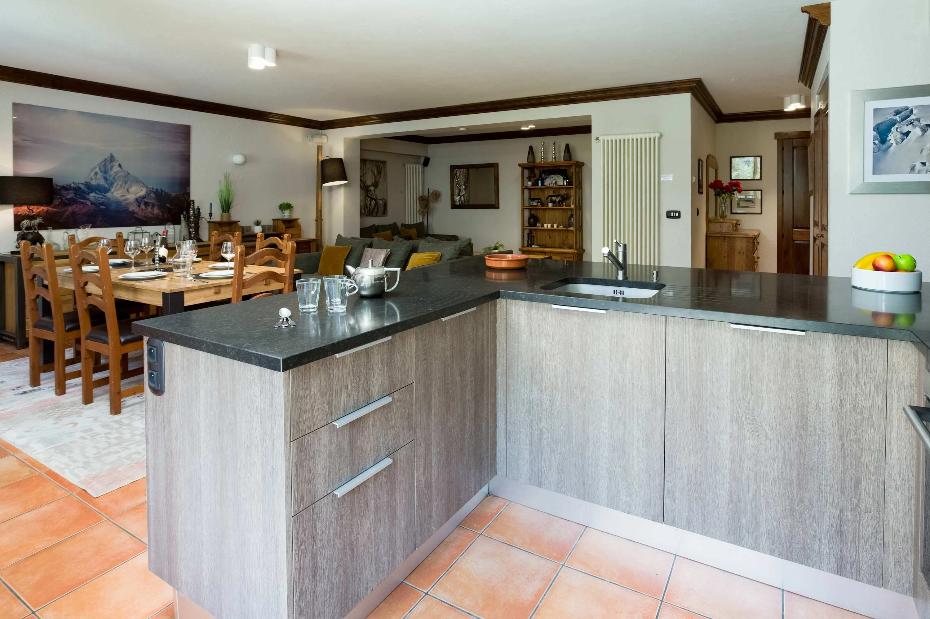 Open plan kitchen, dining, and 2 areas for seating