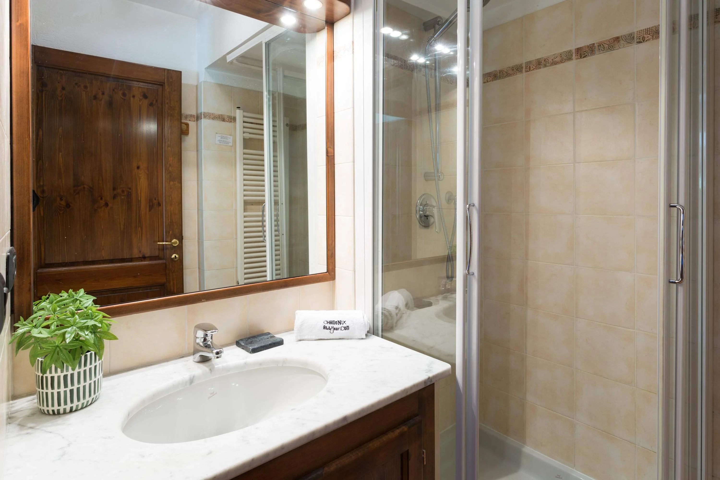 Second bathroom with shower & sink