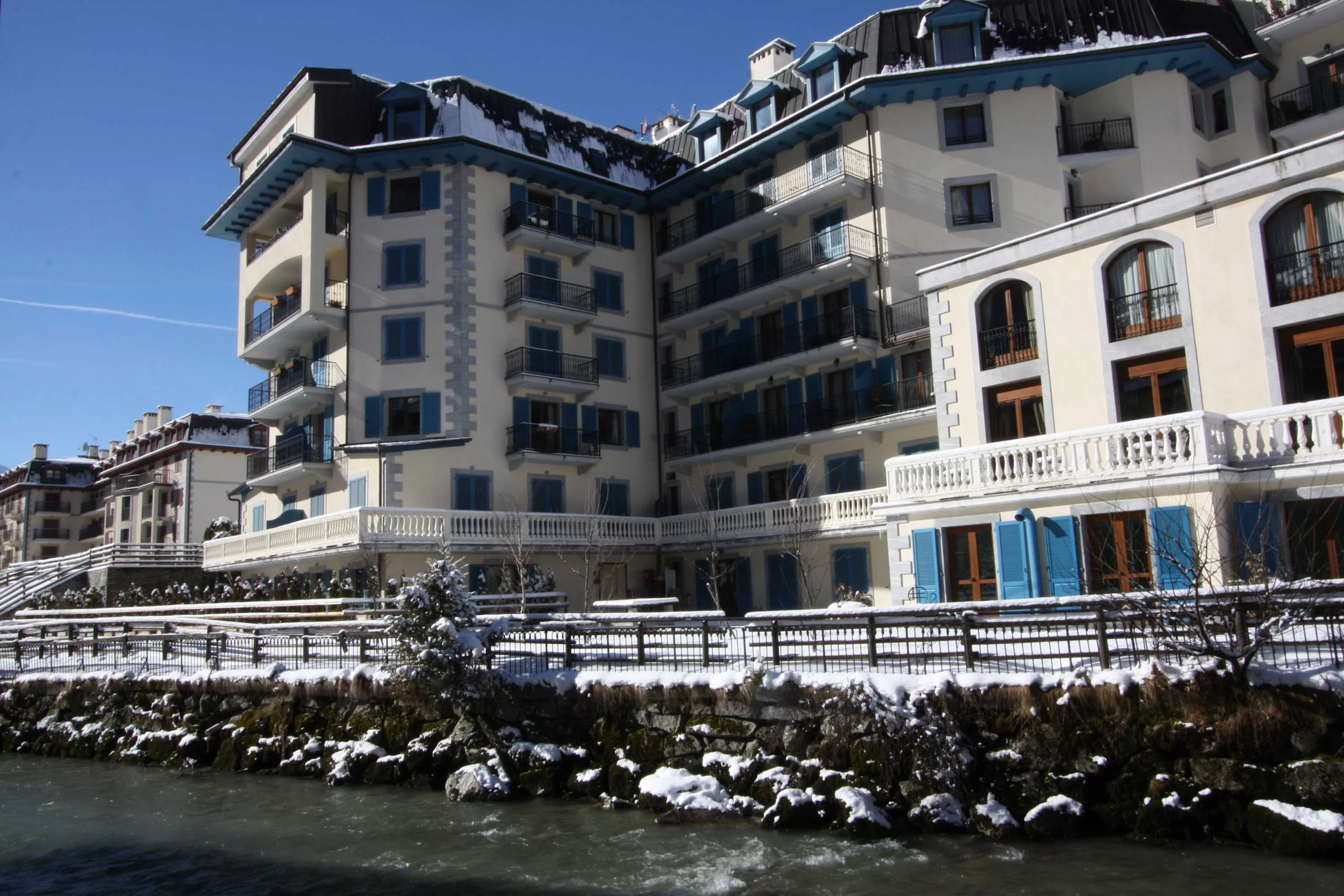 View of apartment building across the river