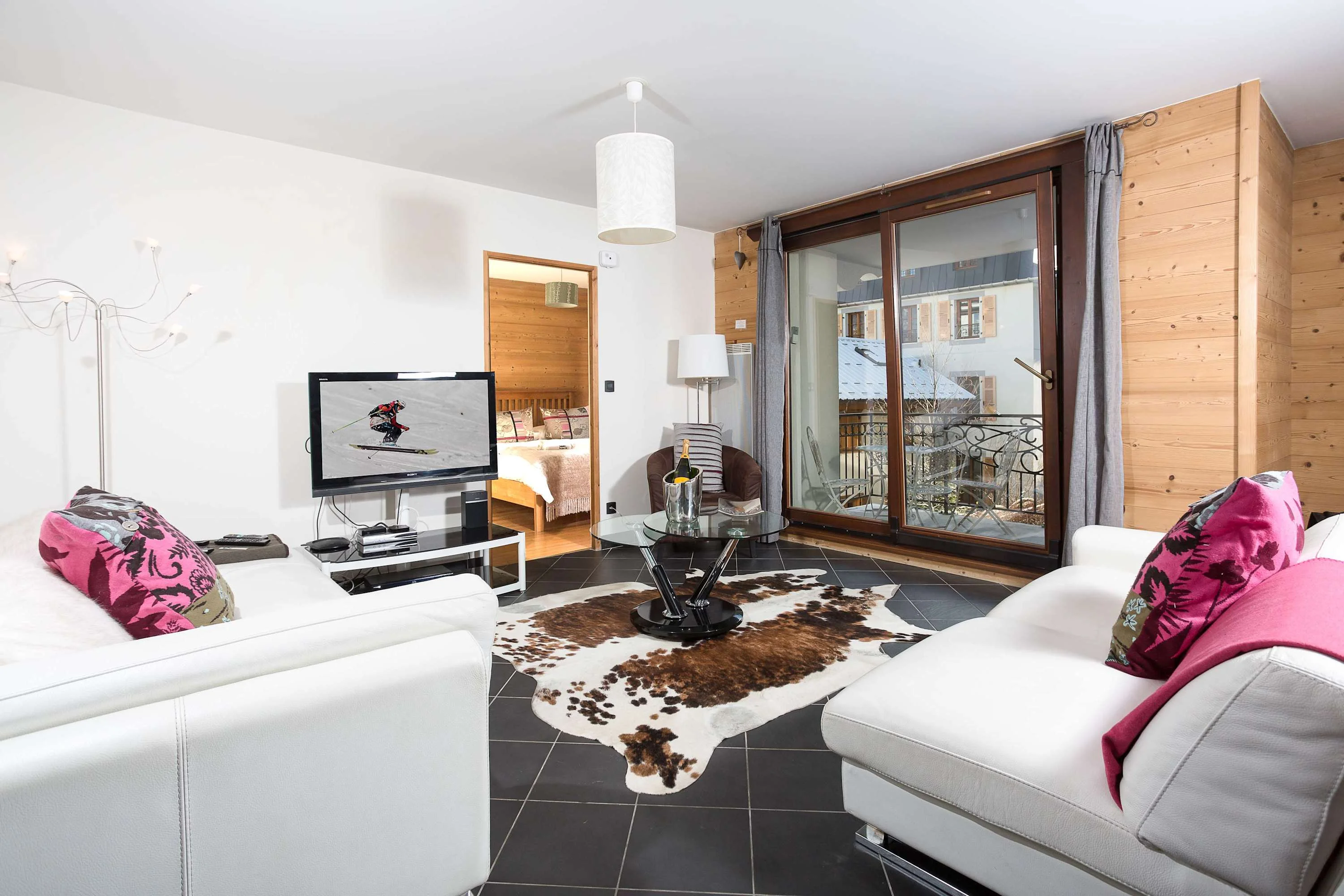 Spacious open-plan lounge leading onto the balcony