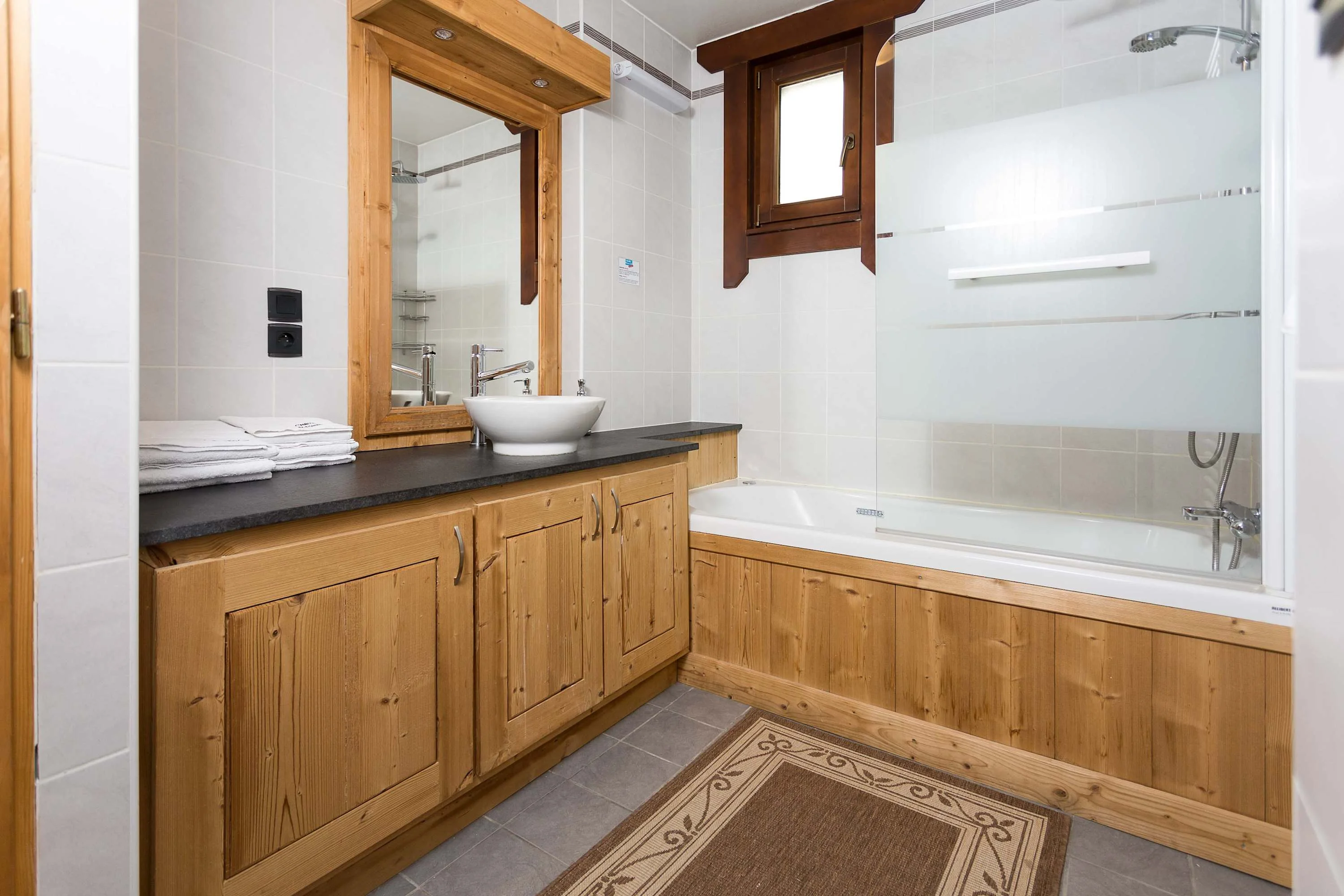 Family bathroom with washing machine