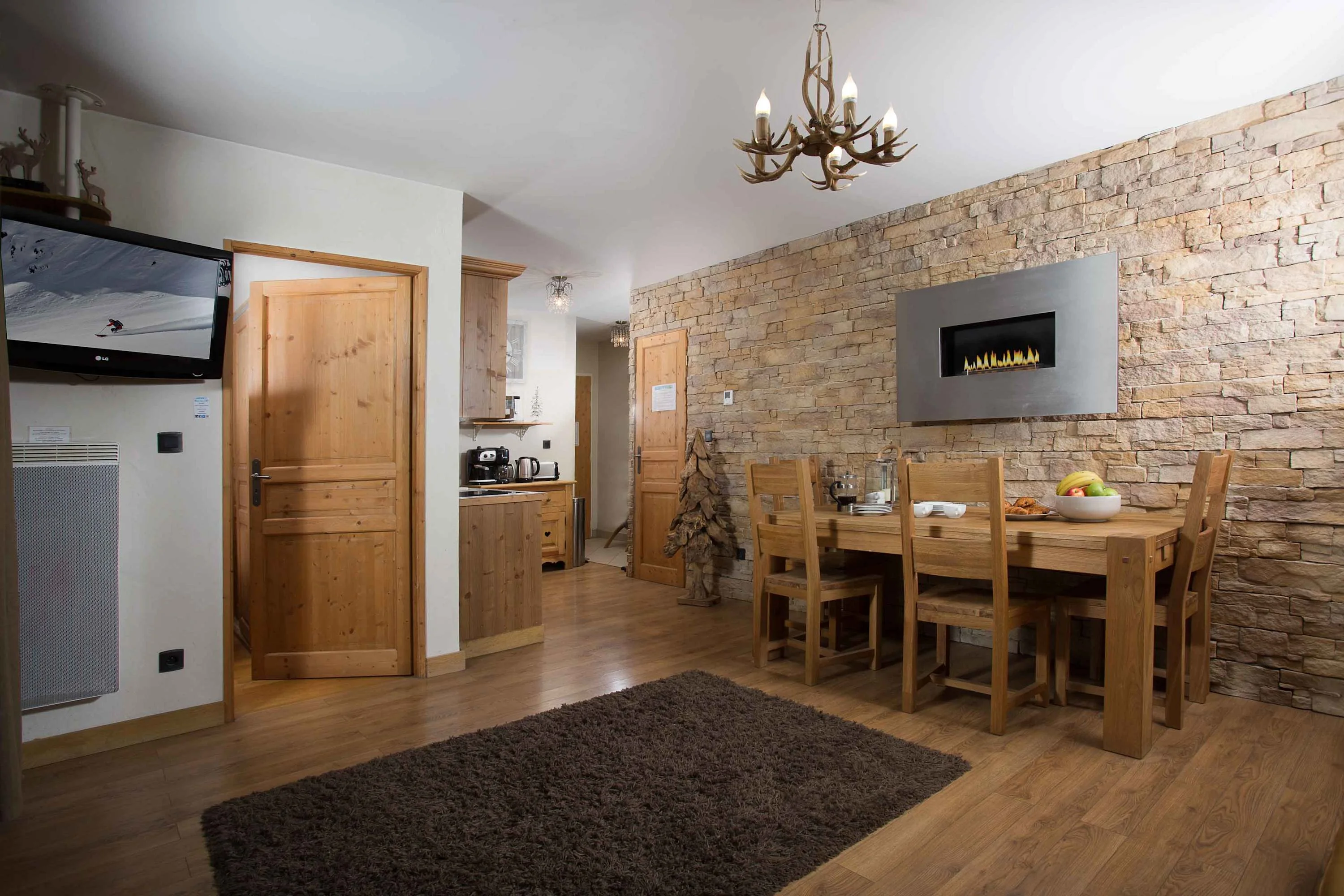 Luxury designed dining area with mural fireplace