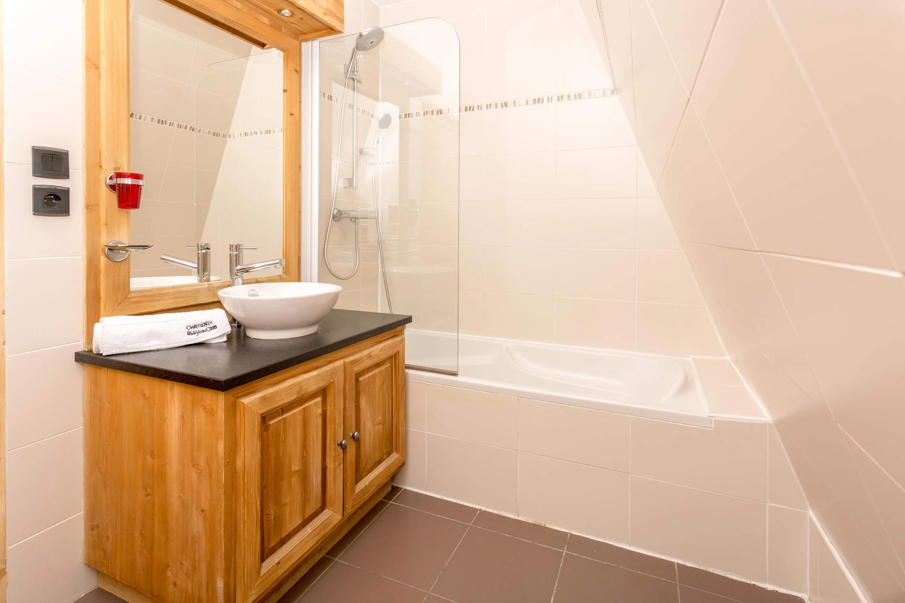 Family bathroom with bath and shower