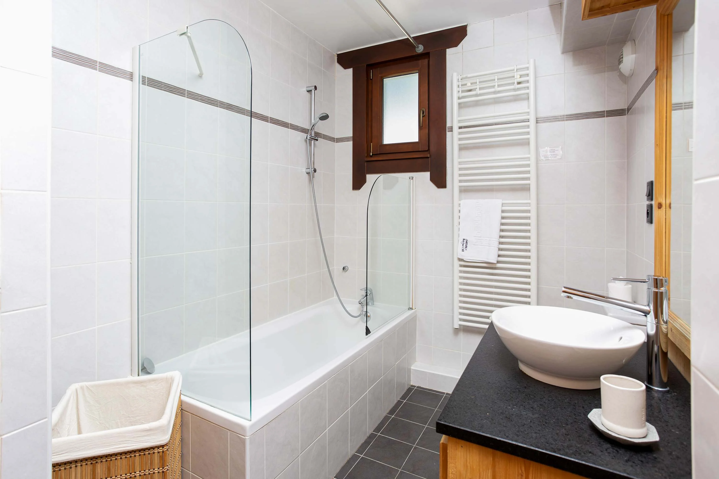 Bathroom with bath and shower