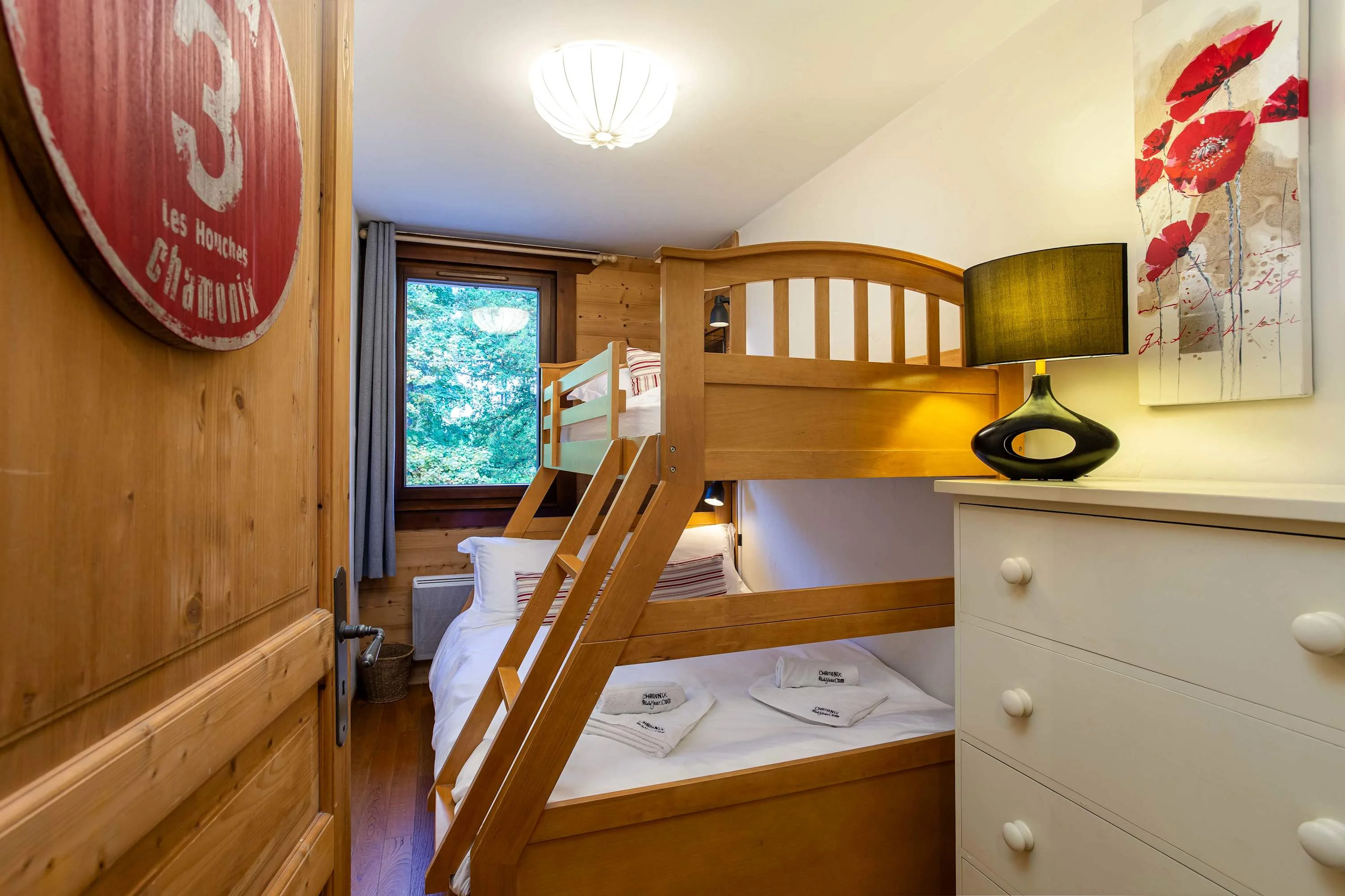 Bunk room with a double & a single bed