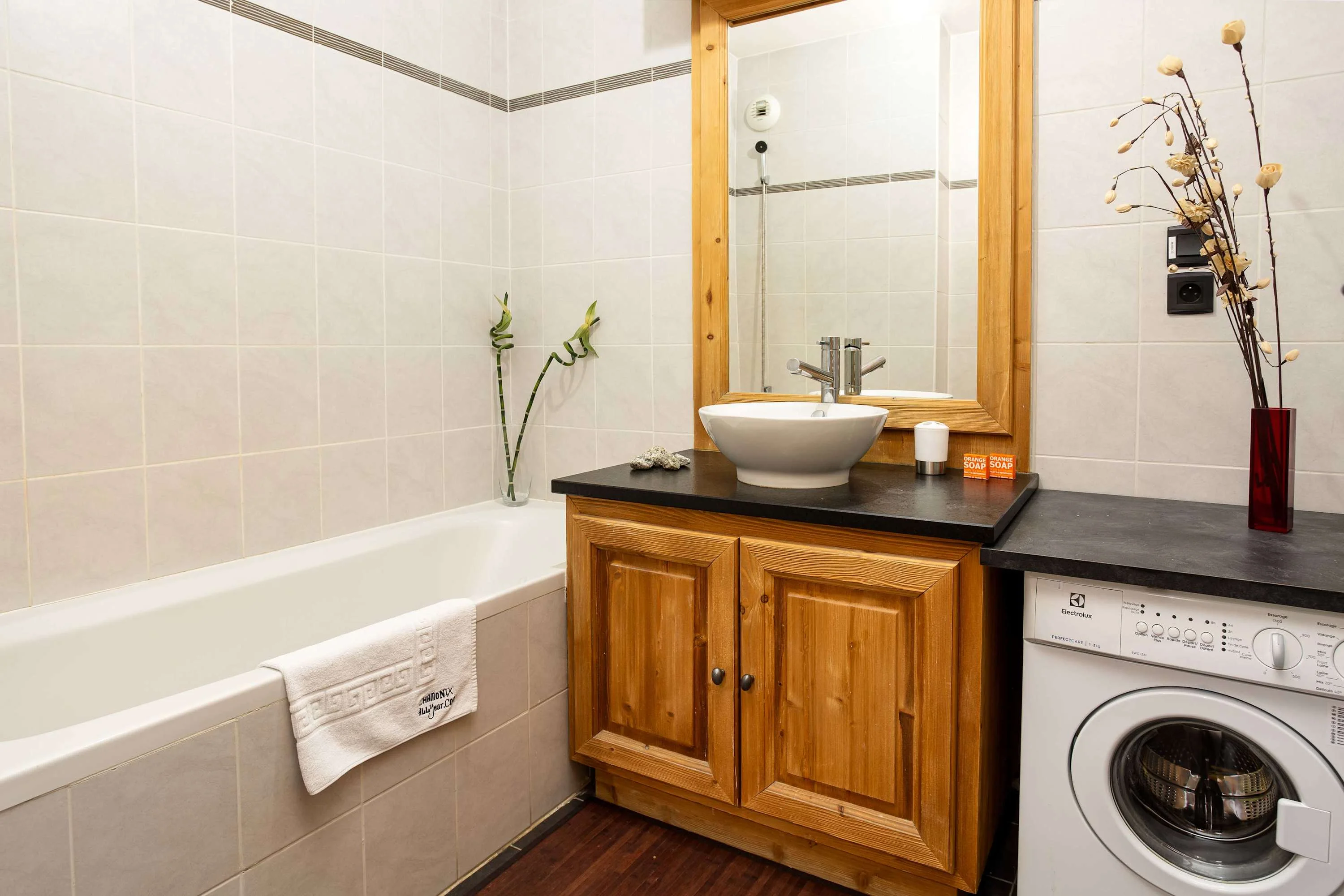 Family bathroom with washing machine